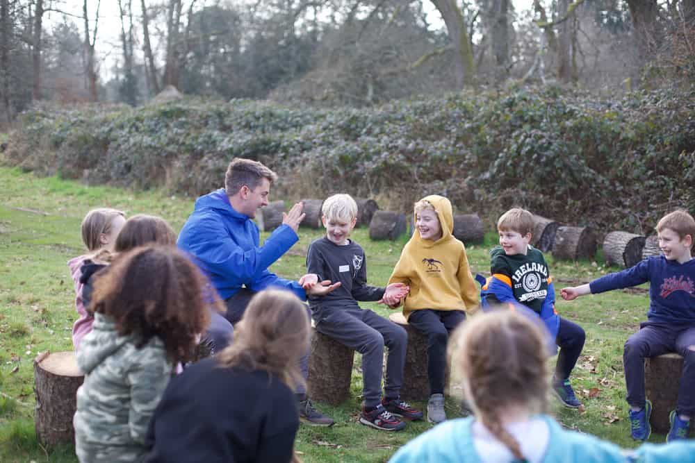 Children having fun at Educamps February Half Term Camp. They're playing outdoor games with the camp leaders.